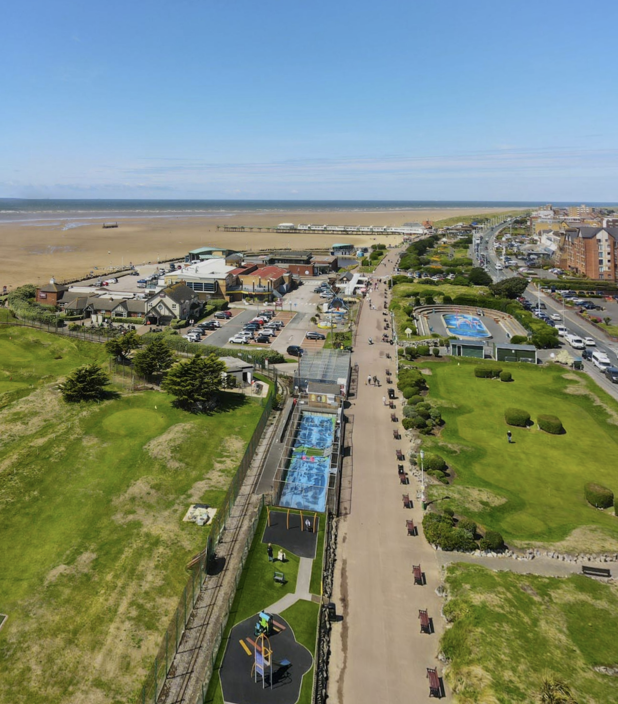 Aerial view of the Fylde Coast promenade with sea, beach and gardens stretching to the horizon